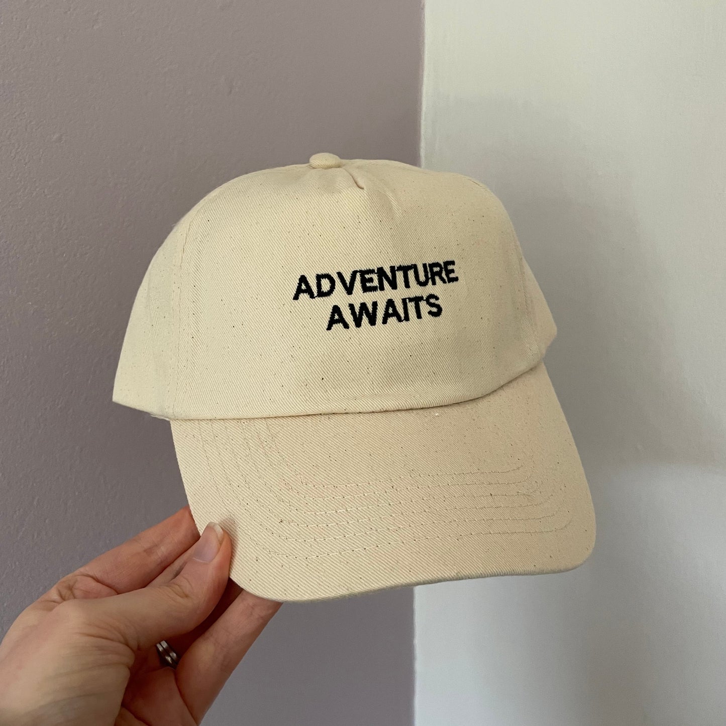 'ADVENTURE AWAITS' Sand cap