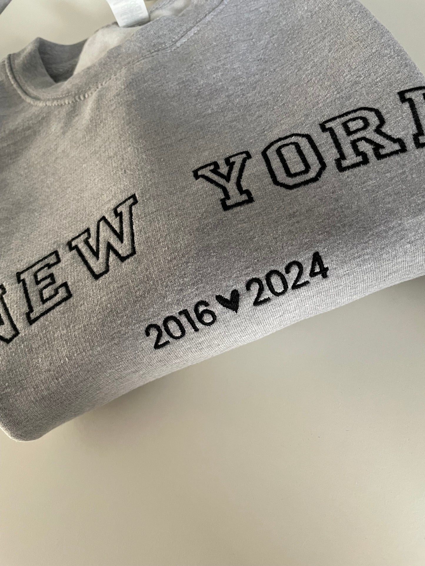 Name + date embroidered sweater